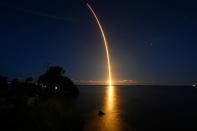 The Inspiration 4 civilian crew aboard a SpaceX Falcon 9 rocket launches from Kennedy Space Center