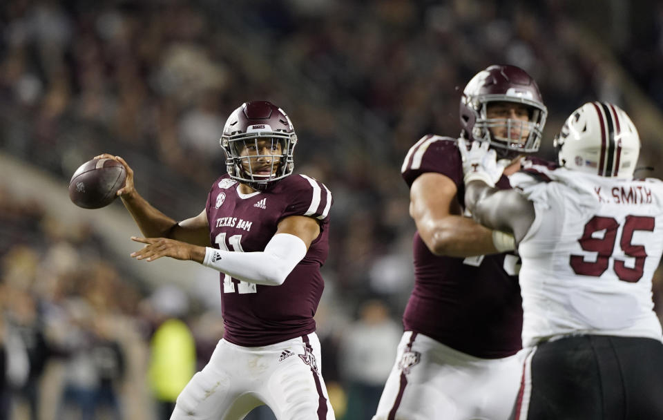 Texas A&M quarterback Kellen Mond (11) throws a pass against South Carolina during the first quarter of an NCAA college football game Saturday, Nov. 16, 2019, in College Station, Texas. (AP Photo/David J. Phillip)