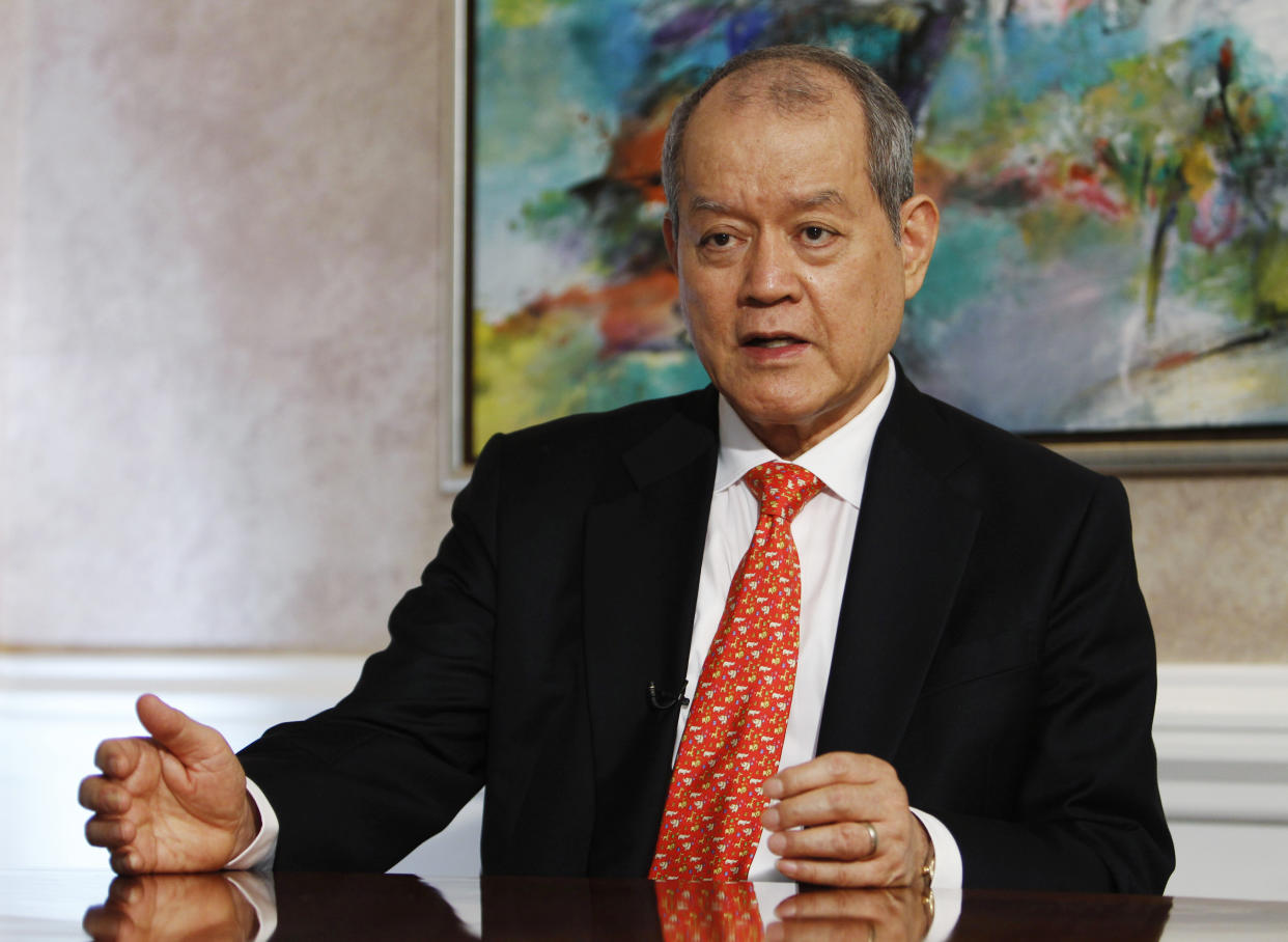 O.K. Lim, founder and chairman of oil trading group Hin Leong, speaks during an interview with Reuters in Singapore June 5, 2013. Singapore oil trader and shipper Hin Leong plans to spend up to$3 billion to build oil terminals and distribution facilities in emerging Asian markets, including fresh investments in Myanmar and Indonesia, to meet rising oil demand from the region. Picture taken June 5. To match Interview HINLEONG-ASIA/EXPANSION   REUTERS/Edgar Su (SINGAPORE - Tags: BUSINESS ENERGY)