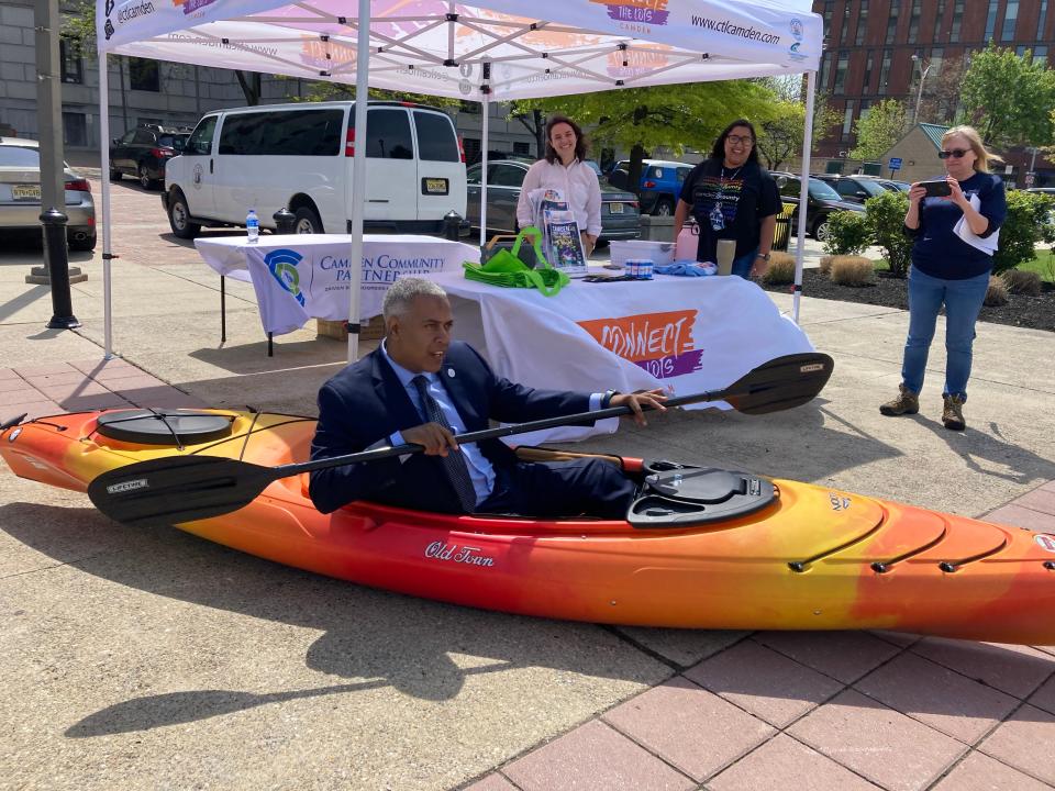 Camden Mayor Vic Carstarphen navigates the concrete river outside City Hall at an event Tuesday announcing the 2022 Connect the Lots event lineup.