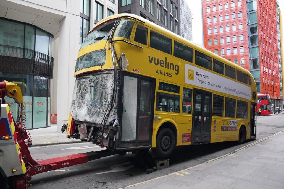 Damage to the bus which crashed into a building destroying its facia, on New Oxford Street (Jonathan Brady/PA Wire)