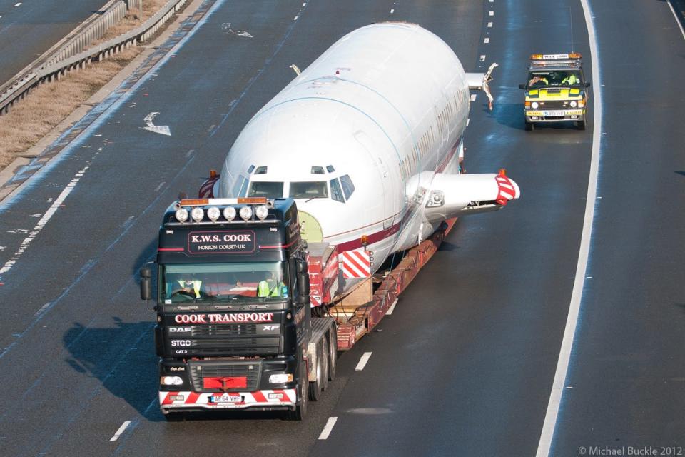 The aircraft moving down the motorway.