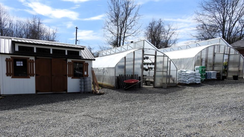 Sonnet Hills Greenhouse at 55211 Township Road 169 features two greenhouses and a shed with plants, seeds, hanging baskets, fertilizers, sprays and more.