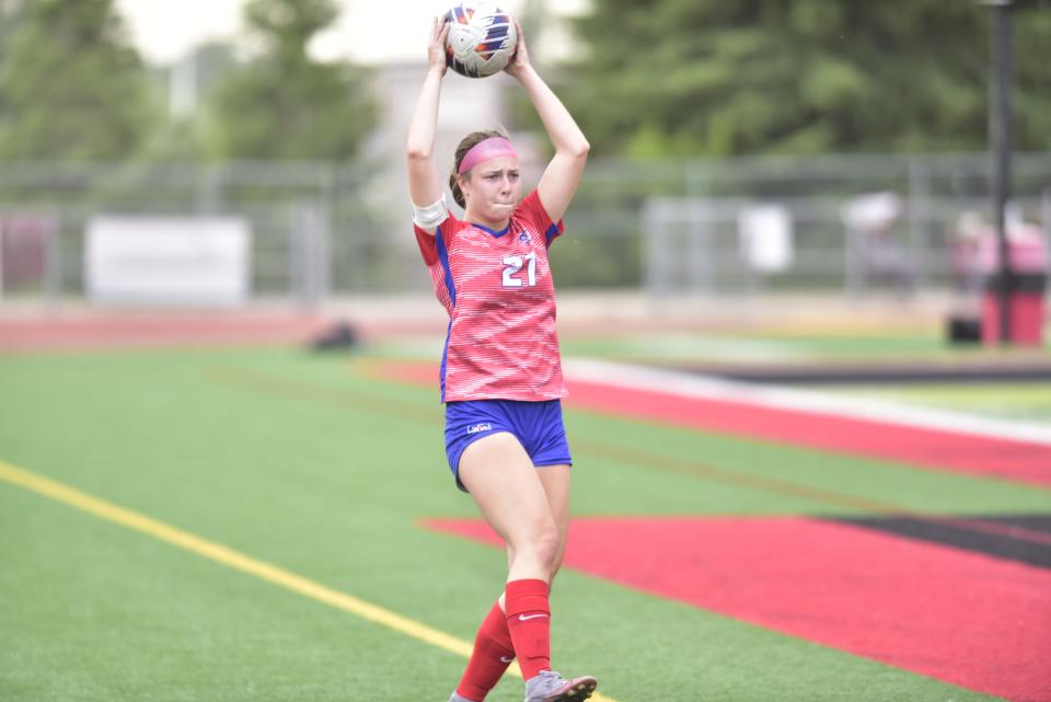 St. Clair's Ella Farkas gathers for a throw-in during the Saints' 3-0 loss to Linden in a Division 2 regional final at Linden High School on Thursday.