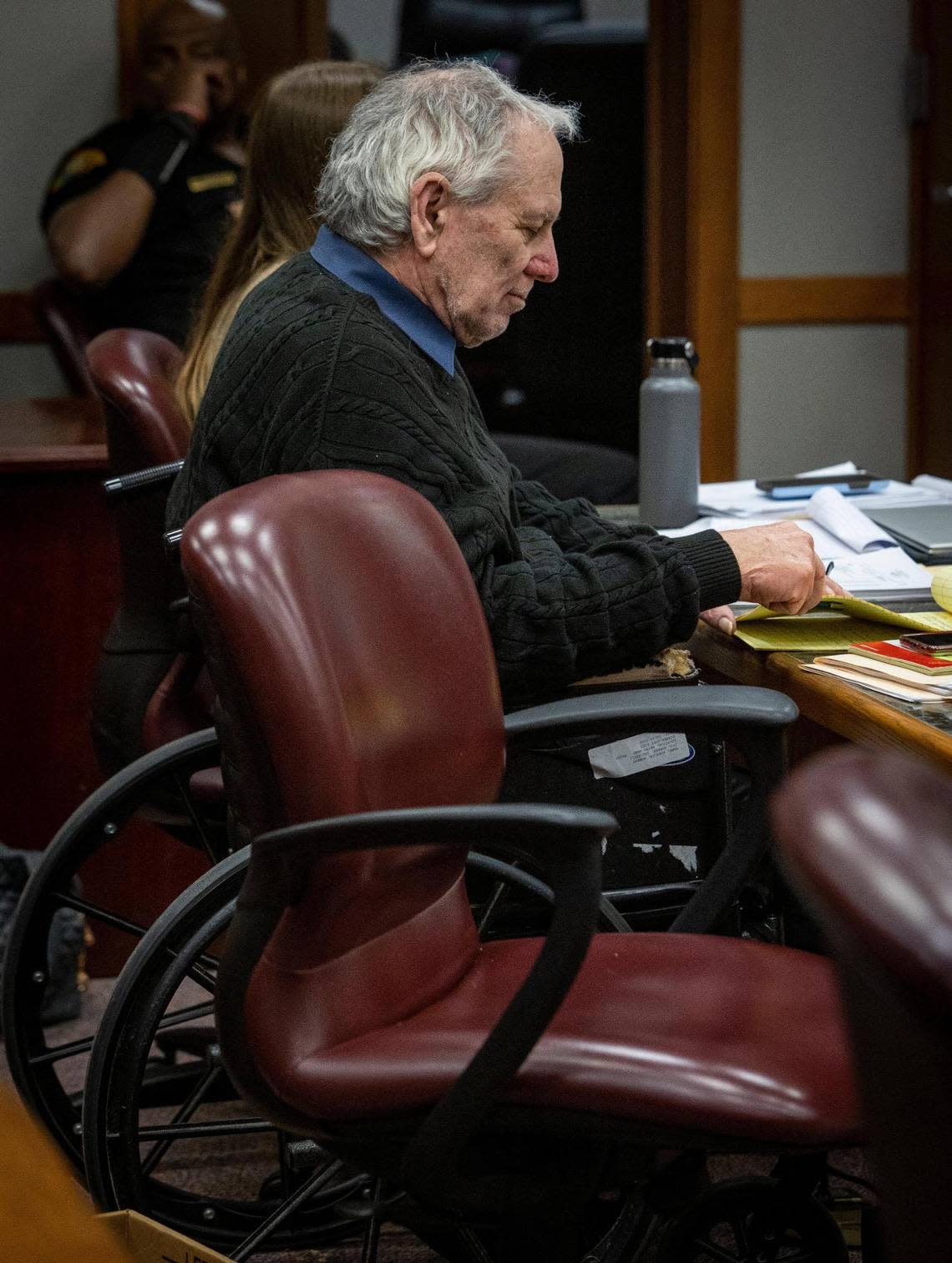 Robert Koehler looks at his noteson Jan. 19, 2023, during his trial currently underway before Judge Daryl Trawick at the Richard E. Gerstein Justice Building in Miami. Koehler is accused of being the “Pillowcase Rapist,” who terrorized dozens of women in South Florida during the early 1980s.