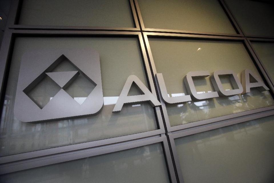 This April 7, 2014 photo shows the Alcoa logo in the lobby of Alcoa's headquarters in Pittsburgh. Alcoa is expected to report quarterly financial results after the market closes on Tuesday, April 8, 2014. (AP Photo/Gene J. Puskar)