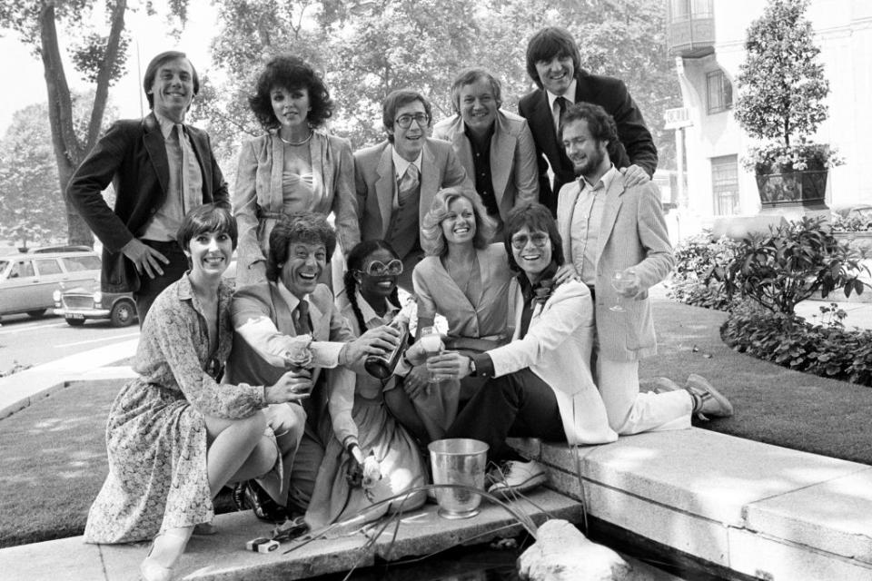 Stars mark Cliff Richard’s 21st year in showbiz: (back row, from left) Christopher Timothy, Joan Collins, Hank Marvin, Brian Bennett, Bruce Welch and Kenny Everett. (front row from left) Anita Harris, Lionel Blair, Patti Boulaye, Elaine Paige and Cliff Richard (PA) (PA Archive)