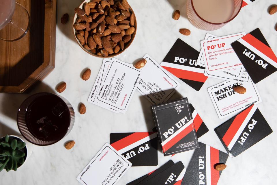 This promotional photo shows playing cards from PO' UP! Card Game, which was created by University of Georgia graduate Lizz Rene.