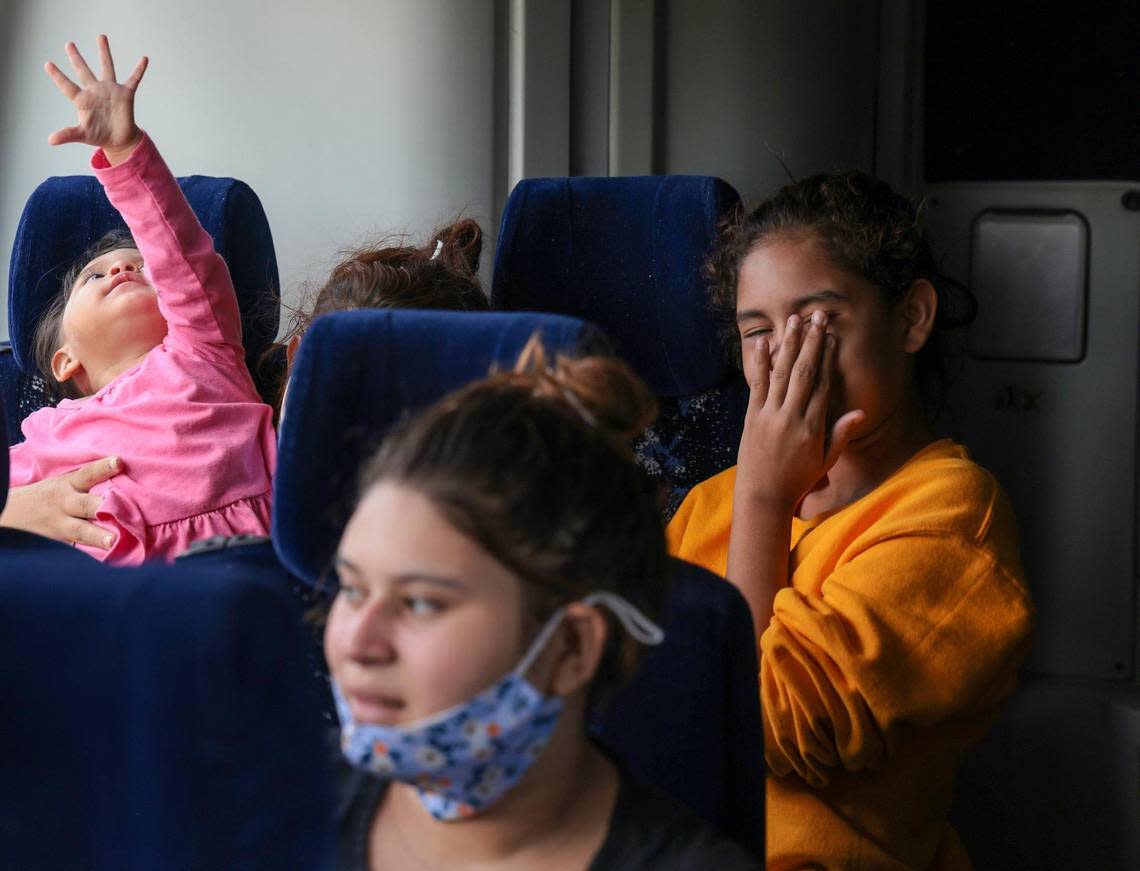 A busload of migrants from Venezuela, Nicaragua and Cuba prepares to be shuttled from Eagle Pass, on the Texas border, to San Antonio by a group of volunteers from the League of United Latin American Citizens. The trip took place on Sunday, Sept. 18, 2022