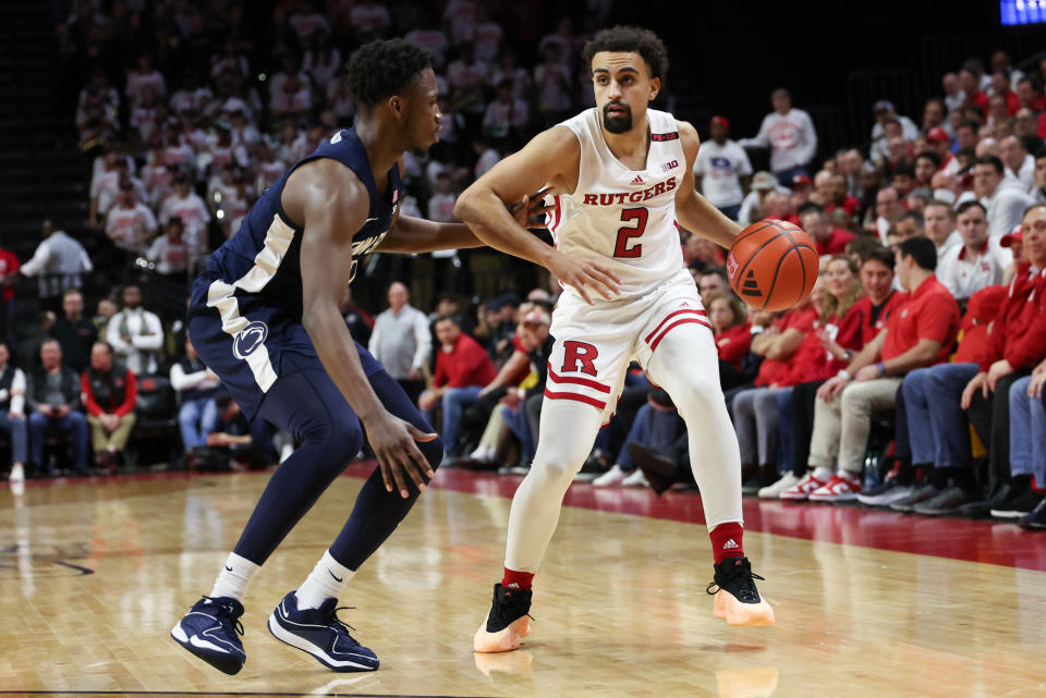 Jan 31, 2024; Piscataway, New Jersey, USA; Rutgers Scarlet Knights guard Noah Fernandes (2) dribbles against Penn State Nittany Lions guard D’Marco Dunn (2) during the second half at Jersey Mike’s Arena. Mandatory Credit: Vincent Carchietta-USA TODAY Sports
