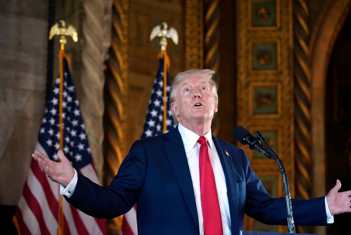 Donald Trump gives a news conference at Mar-a-Lago in Florida. He called a question about why he wasn’t campaigning more ‘stupid’  (AP)