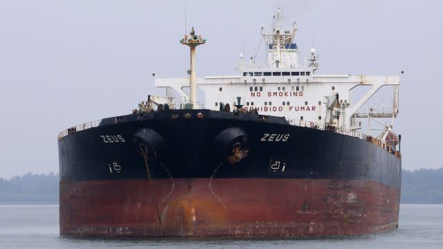 Panamanian-flagged crude oil tanker Zeus anchors at Raffles Anchorage, about 14 km (8.7 miles) south of Singapore September 9, 2012. Picture taken September 9, 2012. REUTERS/Tim Chong (SINGAPORE - Tags: BUSINESS MARITIME TRANSPORT ENERGY) - RTR37RE8