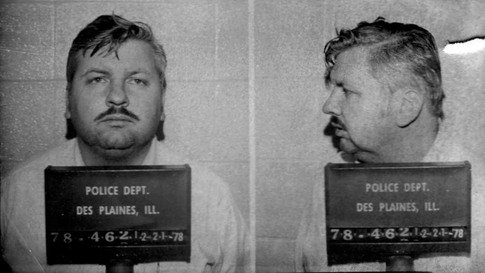 A mugshot of an unknown man with short hair and a mustache, taken by the Des Plaines, Illinois police department on December 21, 1978