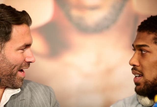 Boxing promoter Eddie Hearn, left, will be looking to seal a good deal for Anthony Joshua