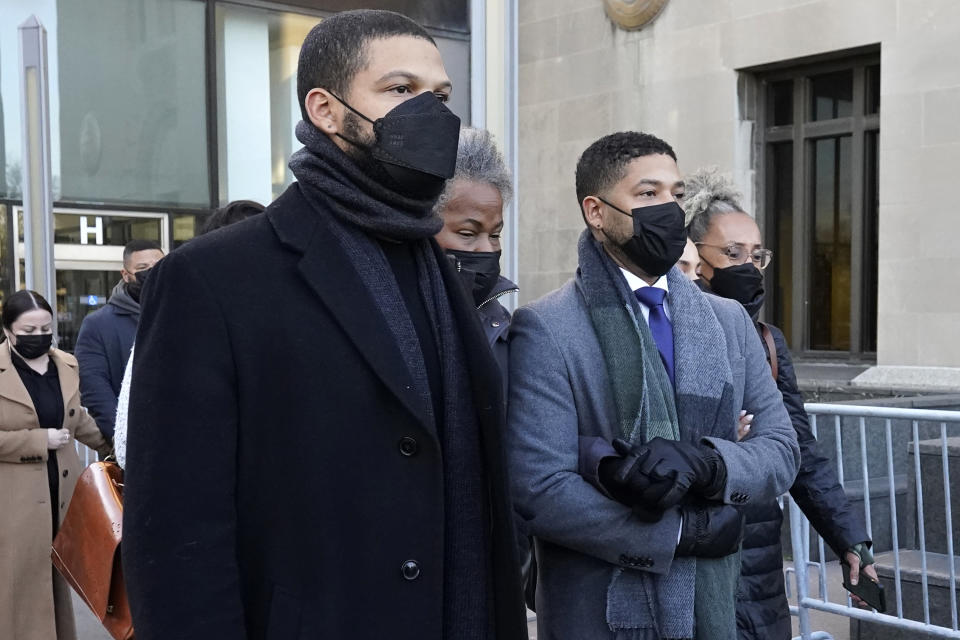 Actor Jussie Smollett, second from right, departs with his mother Janet, second from left, from the Leighton Criminal Courthouse, Wednesday, Dec. 8, 2021, in Chicago, after Cook County Judge James Linn gave the case to jury. (AP Photo/Nam Y. Huh)