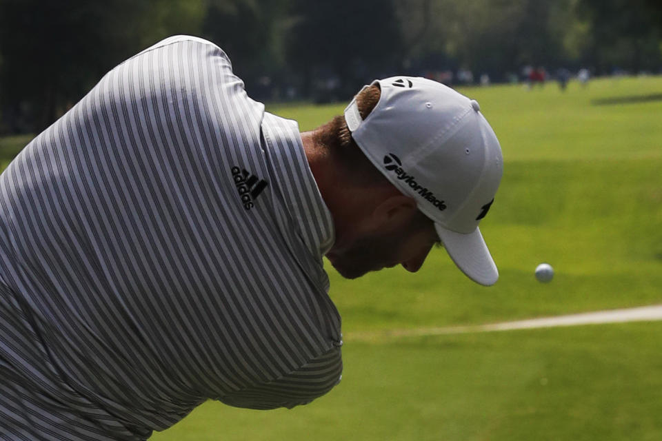 Dustin Johnson hits the ball in the 5th hole on the third round of competition of the WGC-Mexico Championship at the Chapultepec Golf Club in Mexico City, Saturday, Feb. 23, 2019. (AP Photo/Marco Ugarte)