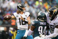 Jacksonville Jaguars' Trevor Lawrence looks to pass during the first half of an NFL football game against the Philadelphia Eagles on Sunday, Oct. 2, 2022, in Philadelphia. (AP Photo/Matt Rourke)