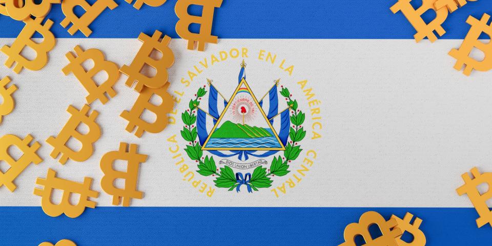 El Salvador flag with bitcoin icons