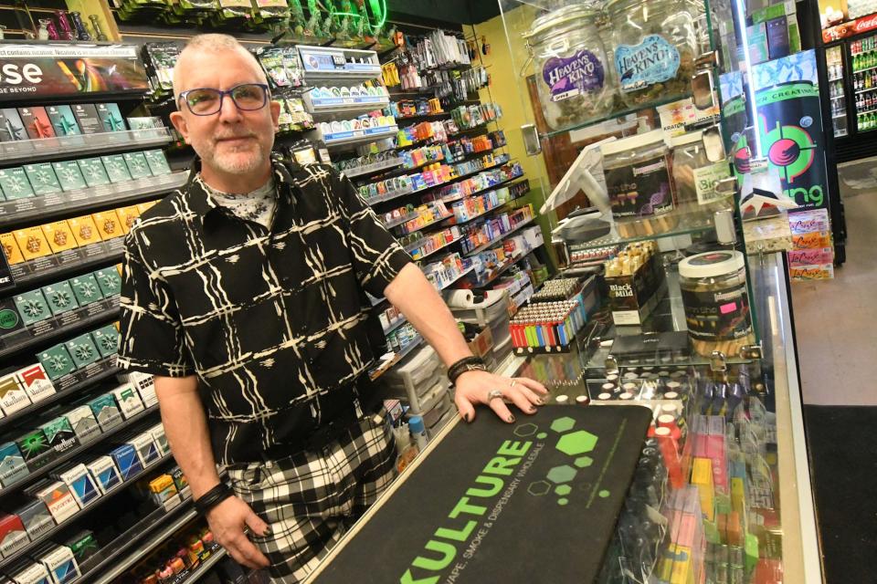 Curtis Thompson has seen all kinds of people come into Village Market in the last 26 years, from celebrities to people peddling "diamonds."