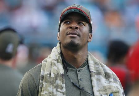 FILE PHOTO: Nov 19, 2017; Miami Gardens, FL, USA; Tampa Bay Buccaneers injured quarterback Jameis Winston watches the replay on the bench during the second half against the Miami Dolphins at Hard Rock Stadium. Reinhold Matay-USA TODAY Sports