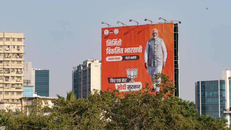 A billboard with India's Prime Minister Narendra Modi displayed on a road in Mumbai, India on April 15, 2024. - Noemi Cassanelli/CNN