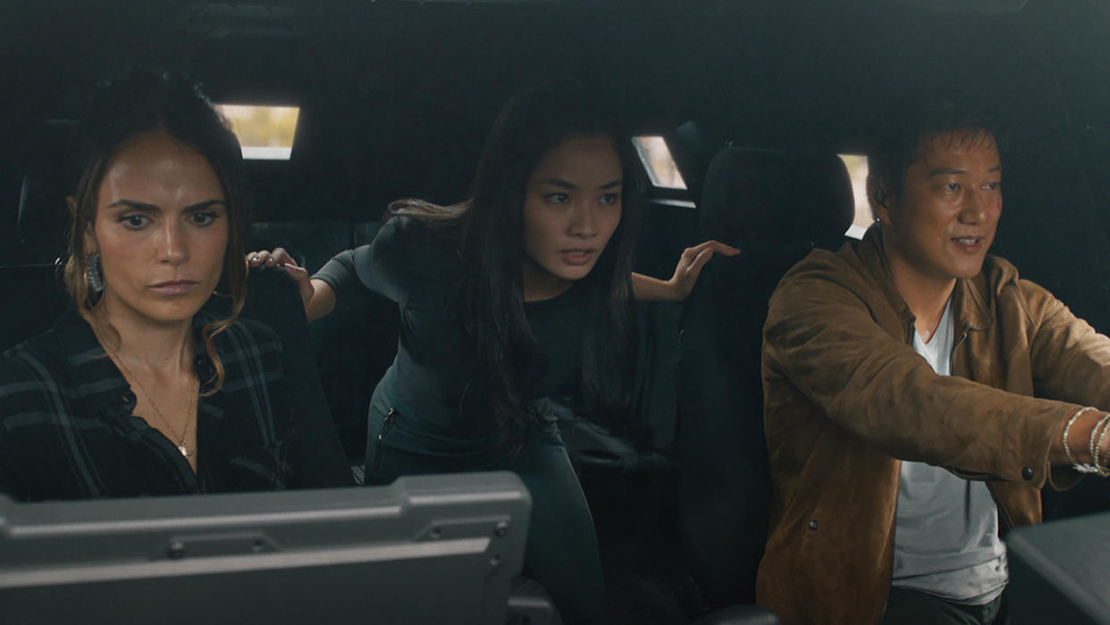  Jordana Brewster, Anna Sawai and Sung Kang inside truck in F9. 