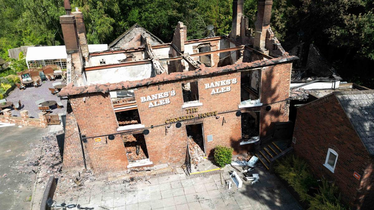 Man And Woman Arrested In Connection With Suspected Crooked House Arson