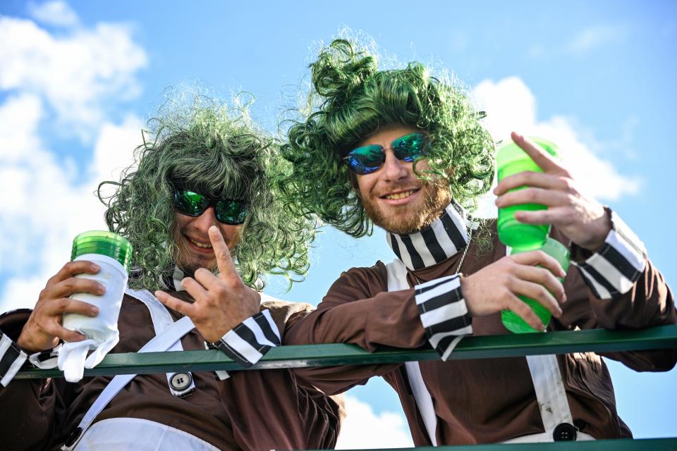 Two people dressed as Oompa Loompas at the Phoenix Open.