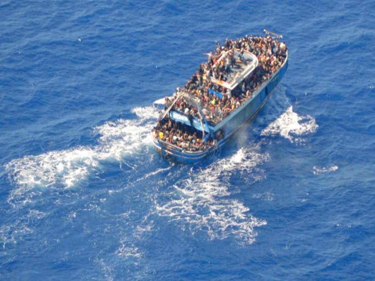 The dilapidated boat had up to 750 migrants onboard (Hellenic Coast Guard/Reuters)