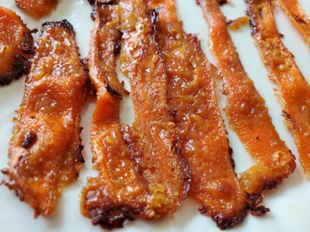 <p>Nettie Moore</p><p>This viral hack has bacon lovers scratching their heads, but loving every bite.</p><p><strong>Get the recipe: <a href="https://parade.com/1037858/nettiemoore/how-to-make-carrot-bacon/" rel="nofollow noopener" target="_blank" data-ylk="slk:Carrot Bacon;elm:context_link;itc:0;sec:content-canvas" class="link rapid-noclick-resp">Carrot Bacon</a></strong></p>