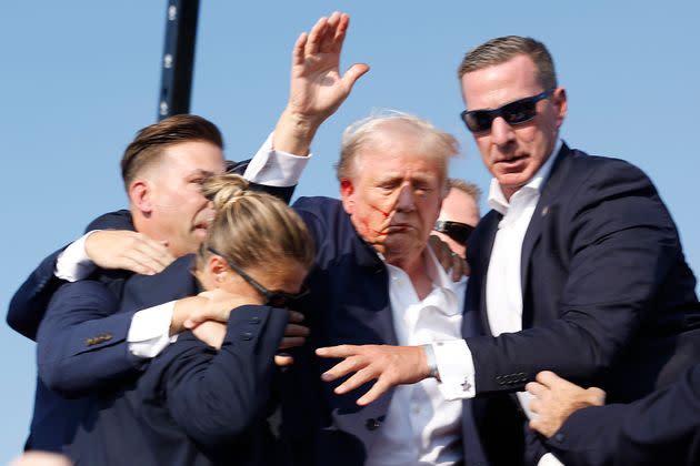 BUTLER, PENNSYLVANIA – JULY 13: Republican presidential candidate and former President Donald Trump is ushered off the stage during a 2024 rally in Butler, Pennsylvania on July 13, 2024. (Photo by Anna Moneymaker/Getty Images)