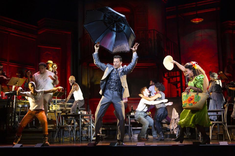 The cast of the North American tour of the musical "Hadestown" performs.