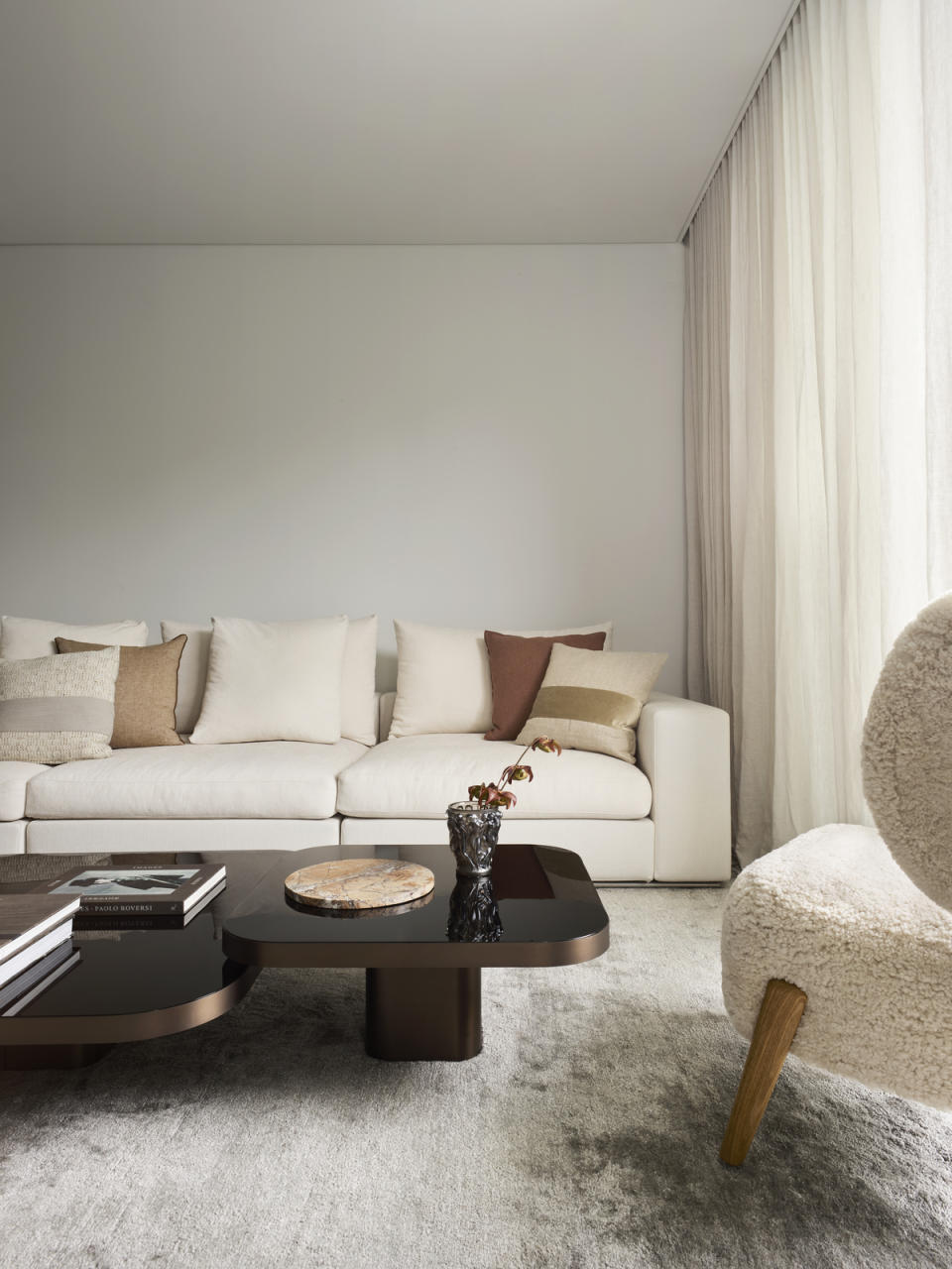 A living room with fresh flowers