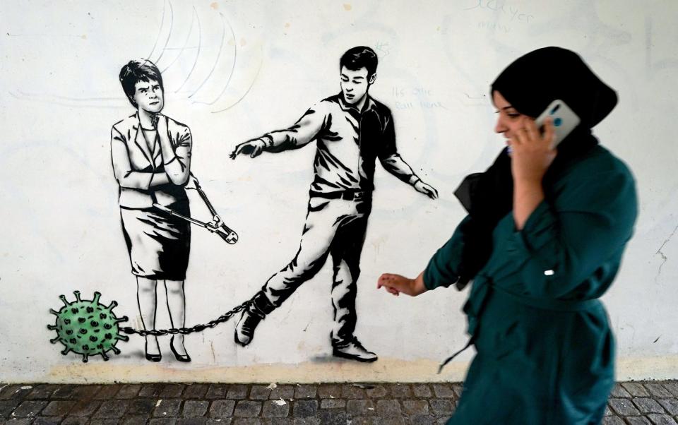 A new piece of street art by The Rebel Bear has appeared on a wall in Cannongate, Edinburgh - Andrew Milligan/PA