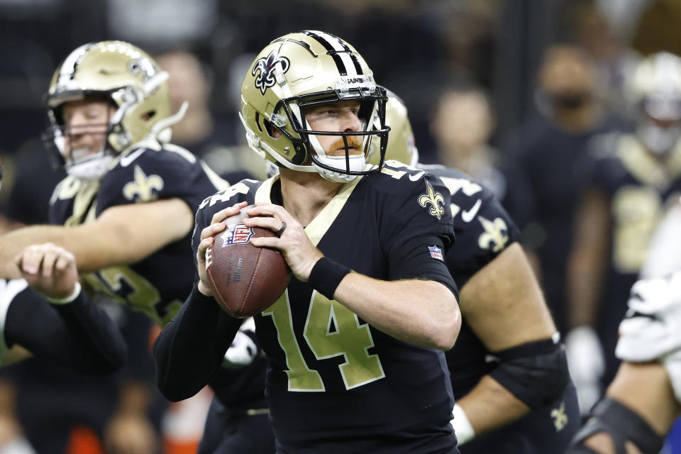 New Orleans Saints quarterback Andy Dalton (14) looks to pass against the Cincinnati Bengals during the first half of an NFL football game in New Orleans, Sunday, Oct. 16, 2022. (AP Photo/Butch Dill)