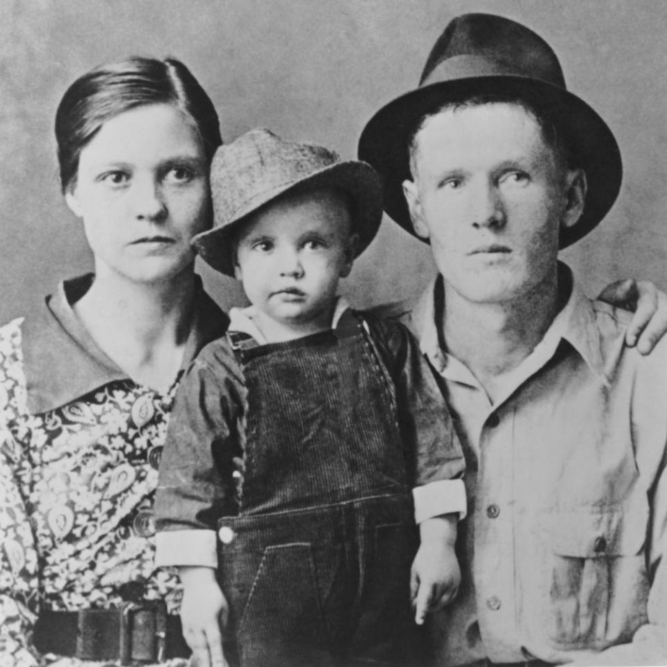 Two-year-old Elvis with his parents Vernon Presley and Gladys Presley