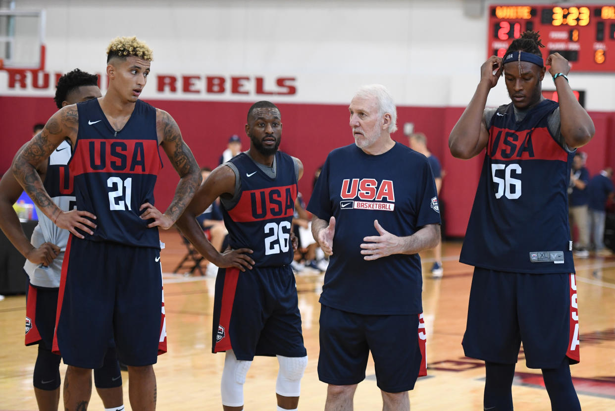 LAS VEGAS, NEVADA - AUGUST 05:  (L-R) Kyle Kuzma #21 and Kemba Walker #26, head coach Gregg Popovich and Myles Turner #56 of the 2019 USA Men's National Team talk during a practice session at the 2019 USA Basketball Men's National Team World Cup minicamp at the Mendenhall Center at UNLV on August 5, 2019 in Las Vegas, Nevada.  (Photo by Ethan Miller/Getty Images)