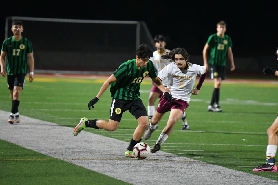 Moorpark senior Justin Conyers dribbles upfield against visiting Simi Valley during the Musketeers' 6-1 Coastal Canyon League win on Jan. 5.