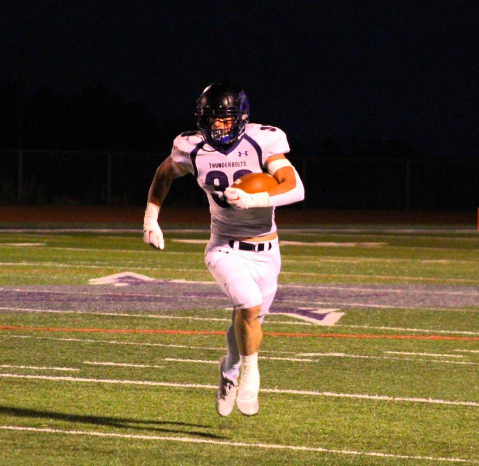 Rye High School Dylan Hurne takes the ball down the sideline for one of his six touchdowns in a game against Ellicott on Friday, Sep. 29, 2023 at Rye High School.