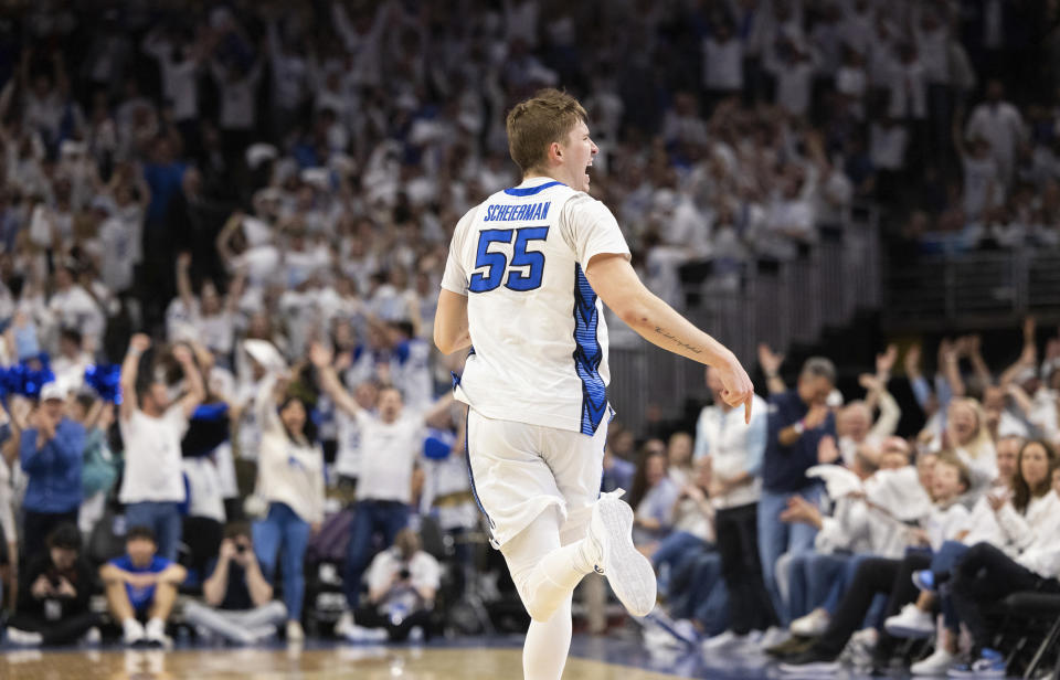 Creighton's Baylor Scheierman (55) celebrates after making a 3-point basket against Marquette during the second half of an NCAA college basketball game Saturday, March 2, 2024, in Omaha, Neb. (AP Photo/Rebecca S. Gratz)