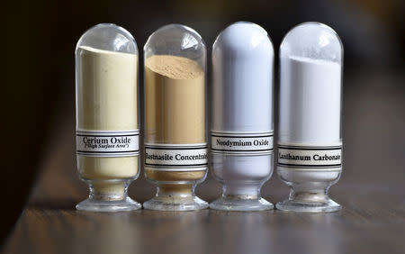 FILE PHOTO: Samples of rare earth minerals from left, Cerium oxide, Bastnasite, Neodymium oxide and Lanthanum carbonate are on display during a tour of Molycorp's Mountain Pass Rare Earth facility in Mountain Pass, California June 29, 2015. REUTERS/David Becker/File Photo