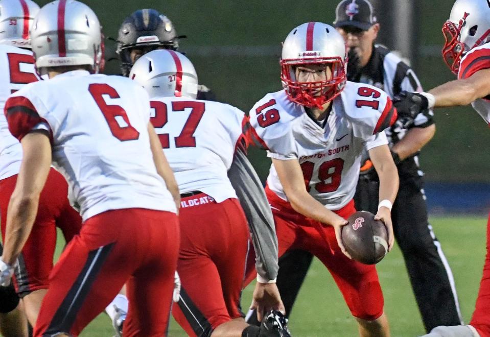 Canton South freshman QB Jack 'Poochie" Snyder (with ball) during the 2020 season.