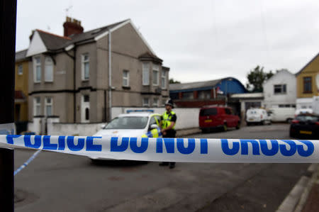 A police officer stands behind cordon tape after a man was arrested in connection with an explosion on the London Underground, in Newport, Wales, Britain, September 20, 2017. REUTERS/Rebecca Naden