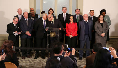 Peru's Foreign Minister Ricardo Luna (C) along with Foreign Ministers and representatives from across the Americas, give a news conference after a meeting to discuss issues related to the Venezuelan crisis, in Lima, Peru, August 8, 2017. REUTERS/Mariana Bazo