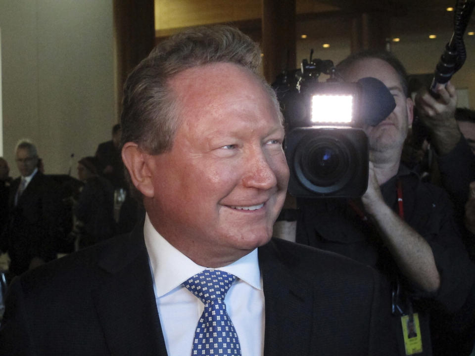 FILE - Iron ore mining magnate Andrew Forrest arrives at Australia's Parliament House in Canberra, May 22, 2017. Australian iron ore miner Fortescue Metals Group has announced, Tuesday, Sept. 20, 2022, a $6.2 billion plan to eliminate fossil fuels and carbon emissions from its operations by the end of the decade. (AP Photo/Rod McGuirk, FILE)