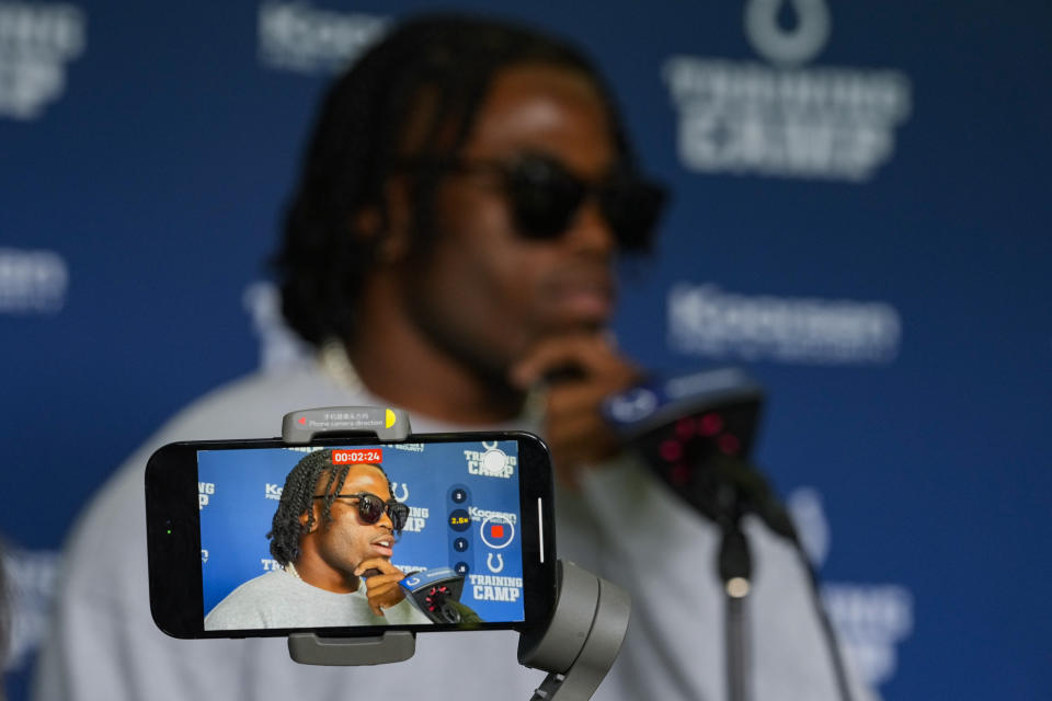 Indianapolis Colts cornerback Kenny Moore II speaks with the media at the NFL team's football training camp in Westfield, Ind., Tuesday, July 25, 2023. The Colts open practice on Wednesday. (AP Photo/Michael Conroy)