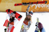 FILE PHOTO - Anna Veith of Austria, Ester Ledecka of Czech Republic, and Tina Weirather of Liechtenstein react during the victory ceremony. REUTERS/Christian Hartmann