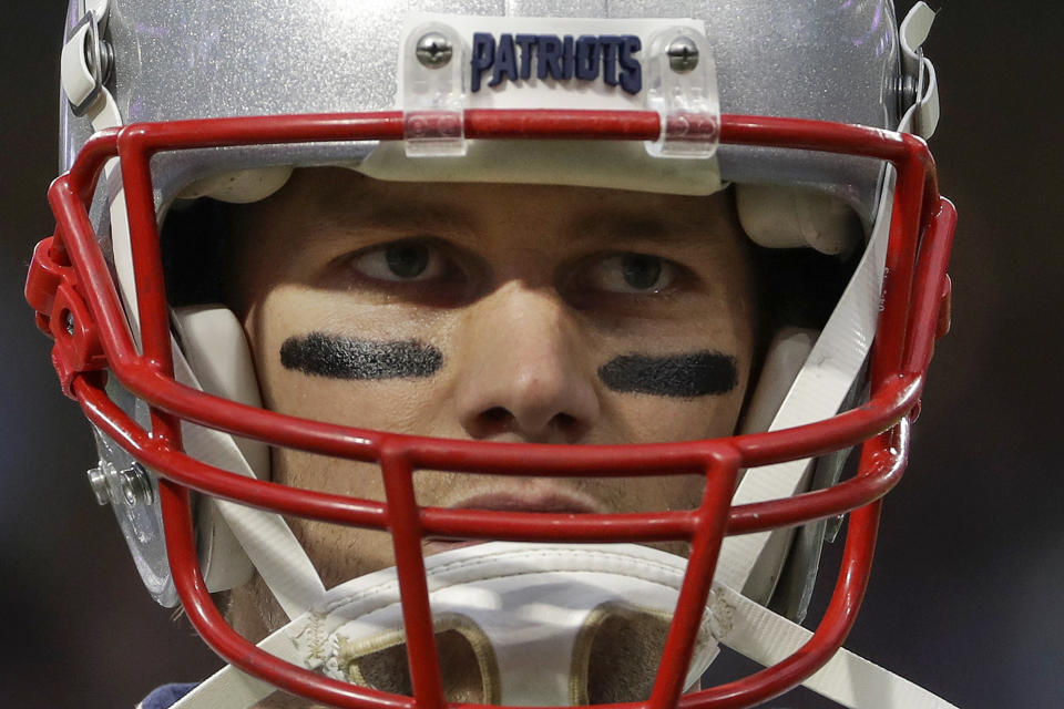 FILE - In this Feb. 4, 2018, file photo, New England Patriots quarterback Tom Brady warms up before the NFL Super Bowl 52 football game against the Philadelphia Eagles in Minneapolis. Brady, the centerpiece of the New England Patriots’ championship dynasty over the past two decades, appears poised to leave the only football home he has ever had. The 42-year-old six-time Super Bowl winner posted Tuesday, March 17, 2020, on social media “my football journey will take place elsewhere.” The comments were the first to indicate the most-decorated player in NFL history would leave New England. (AP Photo/Matt Slocum, File)