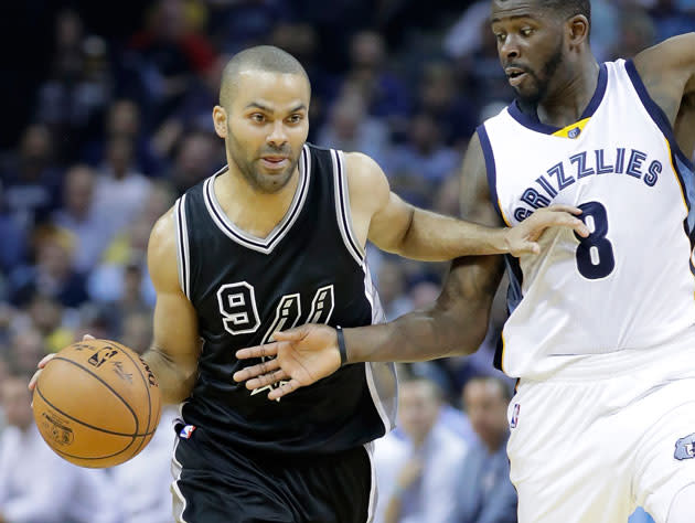 Tony Parker hangs in there. (Getty Images)