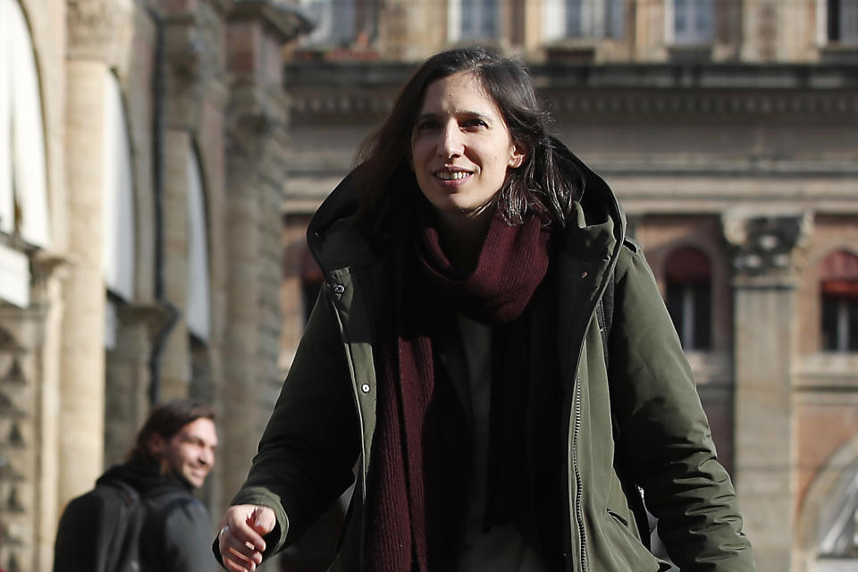 In this photo taken on Thursday, Jan. 30, 2020, Elly Schlein walks on a street after an interview with the Associated Press in downtown Bologna, Italy. A dual U.S.-Italian citizen who cut her political organizing teeth on two Barack Obama campaigns is emerging as the latest rising star in Italian politics. (AP Photo/Antonio Calanni)